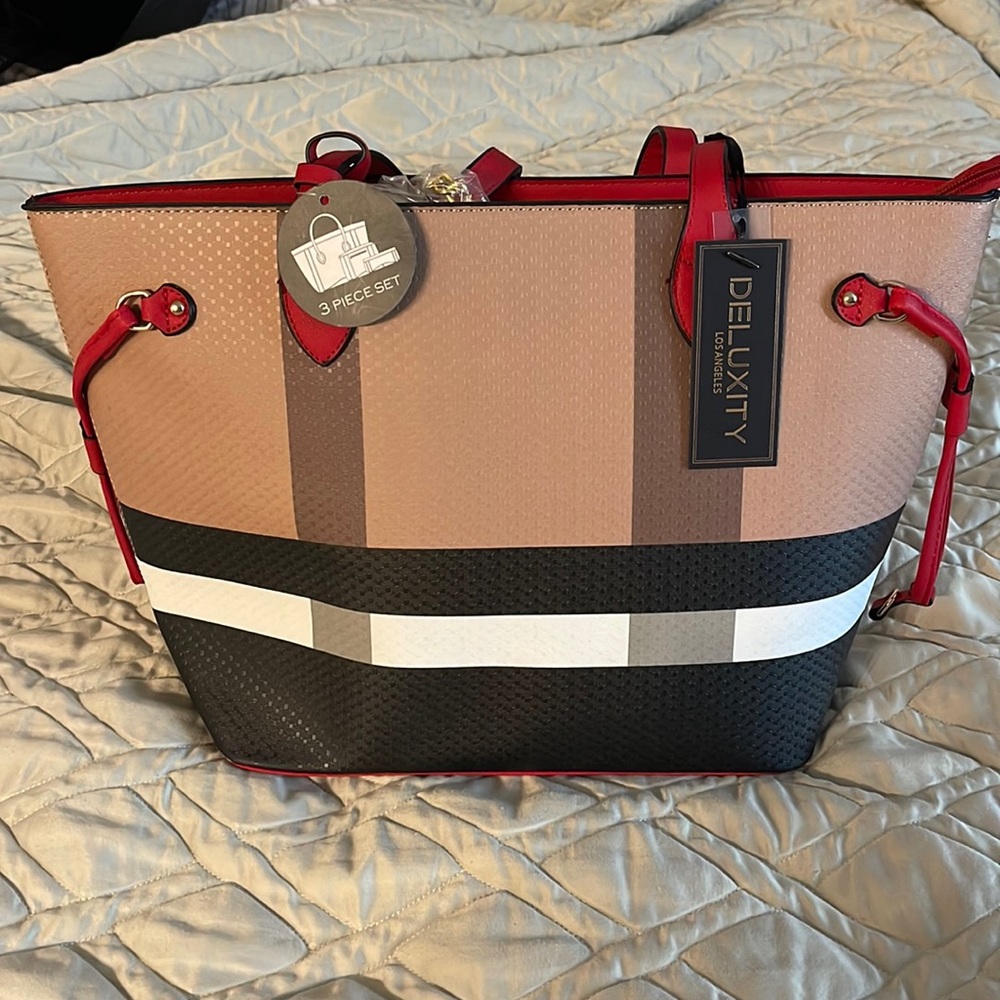 The original deluxe, 3 bags set, new with tag.